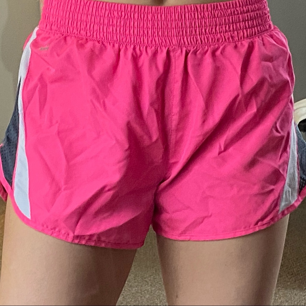 Neon pink running shorts